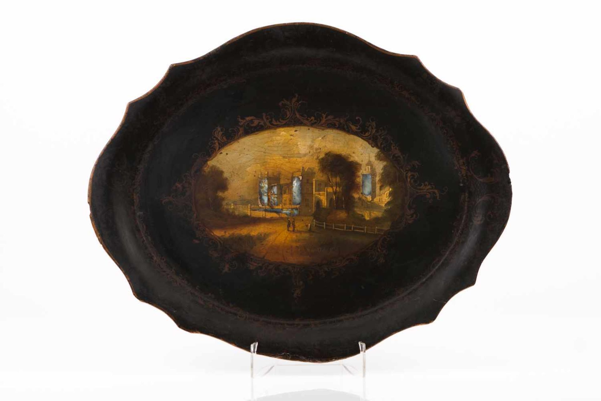 A scalloped trayLacquerGilt decoration with cartouche at the centre depicting landscape with