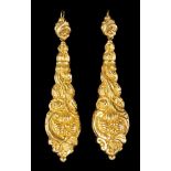 A pair of spindle shaped earrings19th century portuguese gold with naturalistic moulded