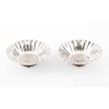 A pair of bowlsSilver. Raised centre with flowers and fluted lipOporto 833/000 "eagle" assay mark