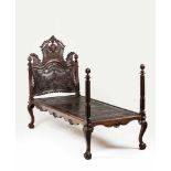 A rare D.João V / D. José period daybedRosewoodDensely shell carved, pierced and scalloped