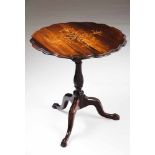 A tripod tableRosewoodFloral marquetry tilt-topOn a fluted shaft ending in claw and ball