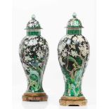 A pair of lided potsChinese export porcelainPolychrome "Famille Noir" enamels decoration with