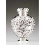 A large vasePortuguese silver with lilies and foliage repousse motifs. Removable liningOporto 833/