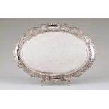 An oval platterEarly 20th c. European silver. Hammered base and pierced lip, with foliage scrolls
