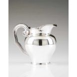 A water jugSilver; plain body with scalloped lip and volute shaped handleOporto 833/000 "eagle"