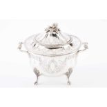 A small tureenPortuguese silverOn four feet, engraved decoration with floral motifs and