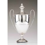 A bowlEnglish silverUrn shaped with volute handlesPart fluted body with engraved armorial and