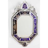 A Venetian mirrorOctagonal, with engraved decoration of floral motifs Scalloped crest and apron