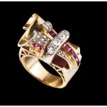 A Retrô ringGold and silverDesigned as a double volute partly set with synthetic rubies, rose cut