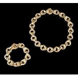 A necklace and braceletA set in wide gold ringsItalian assay marks (585/000)163g