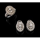 A pair of earrings and ring800/000 gold hanging shower, set with 3 round brilliant cut diamonds (