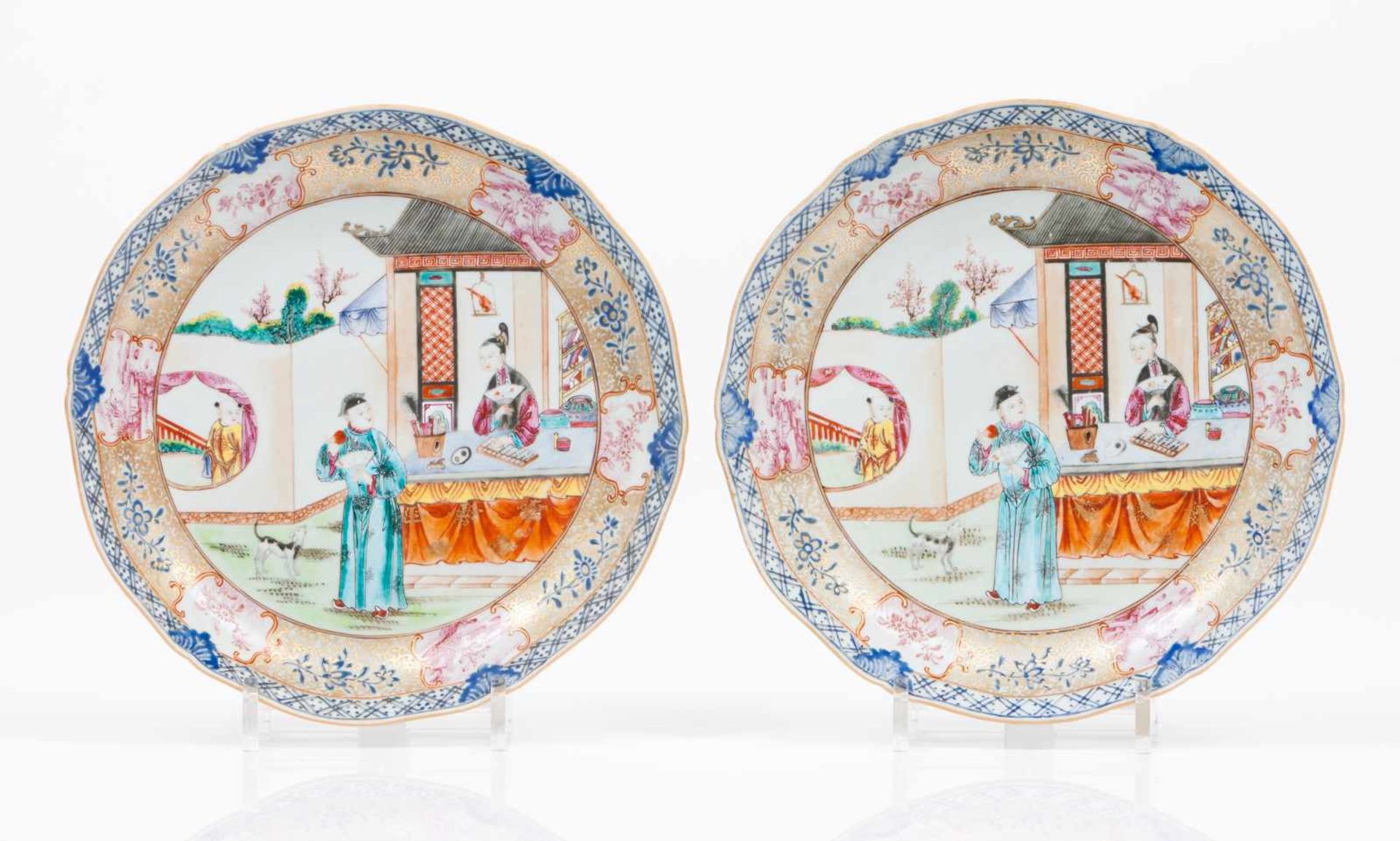 A pair of scalloped saucersChinese export porcelainPolychrome and gilt decoration with oriental