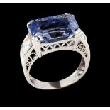 A ringPlatinum, set with sapphire (ca.2.60ct) and 2 round brilliant cut diamonds (ca.0.90ct)Mid 20th