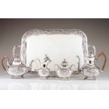 Large tea and coffee setRaised and chiselled Portuguese silver tray, tea and coffee pots, sugar bowl