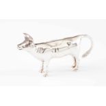 A creamerA Portuguese silver cow sculptureLisbon 835/000 "eagle" assay mark post 1985 and maker's