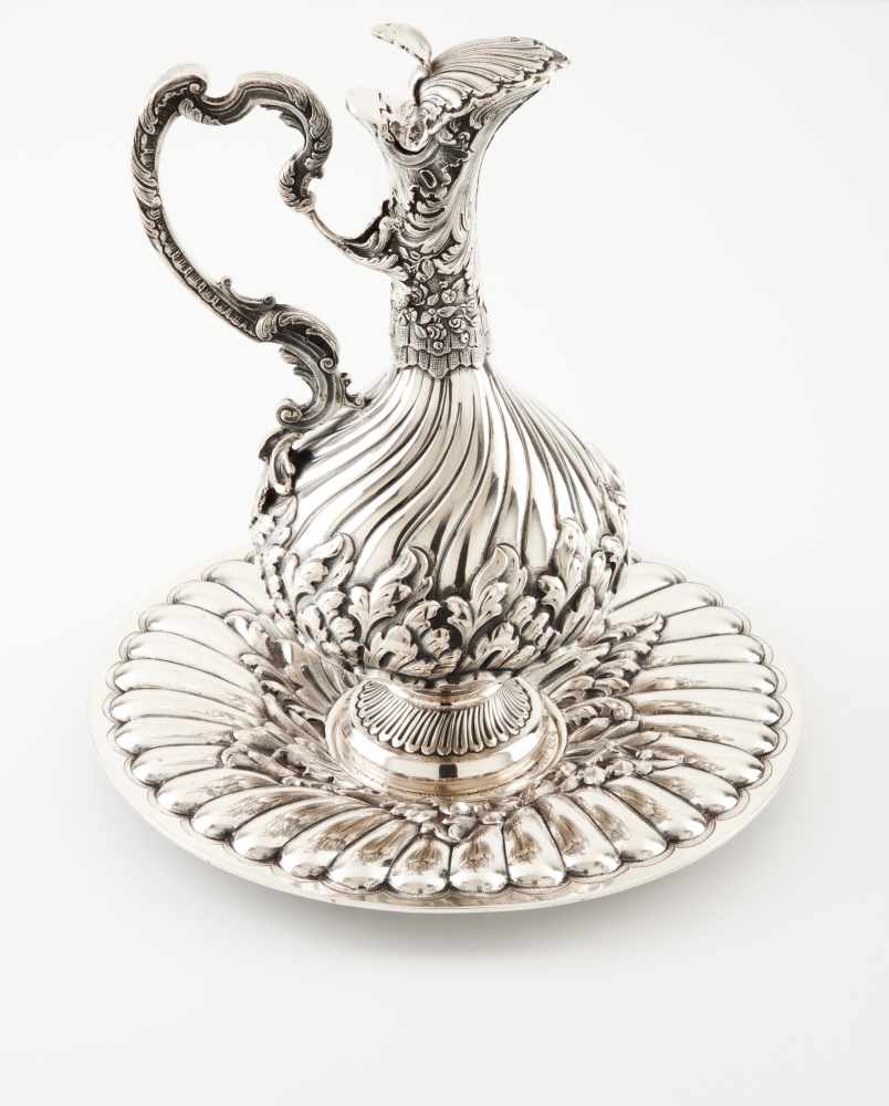 Ewer with dishSilverSpiral fluting and chiselled decoration with floral motifsGuarantee mark,