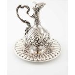 Ewer with dishSilverSpiral fluting and chiselled decoration with floral motifsGuarantee mark,