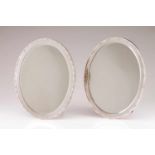 A Toilette Set, LEITÃO & IRMÃOPortuguese silverComposed of a pair of large oval table mirrors, two