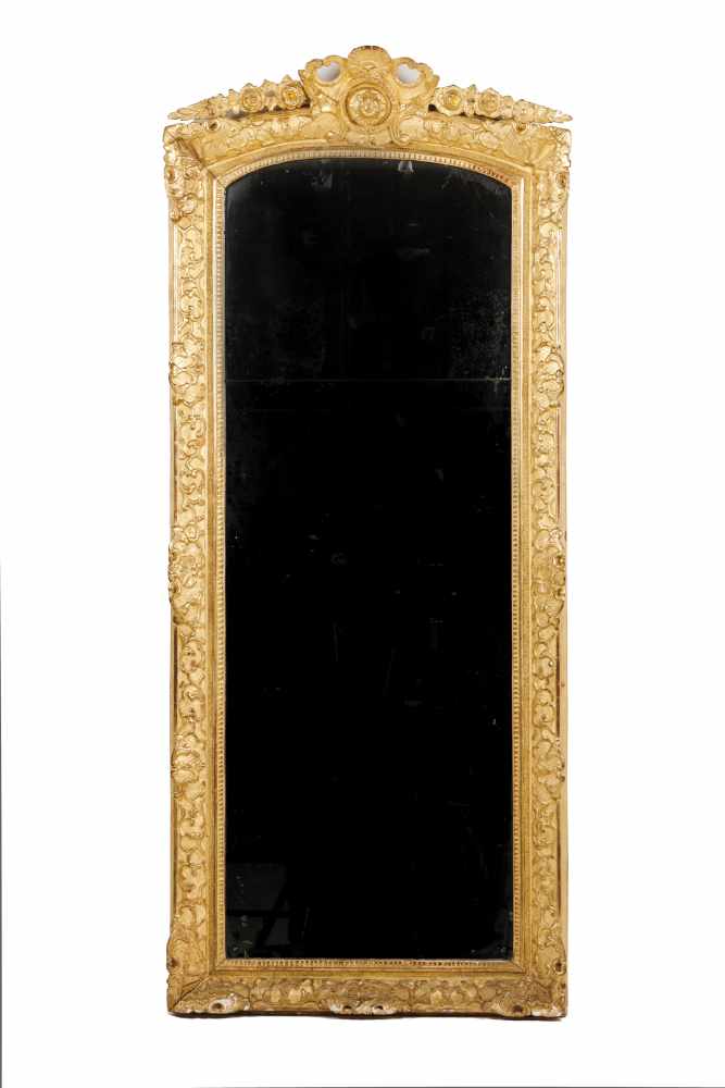 A Regence mirrorCarved and gilt woodDecorated with floral and shell motifsFrance, 18th century187x77