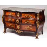 A Louis XV commodeRosewood and other timbersGilt bronze metalware and marble topThree short and