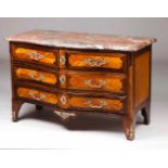 A Louis XV commodeRosewood and jacaranda veneered with marquetry decoration and bronze metalwareWith
