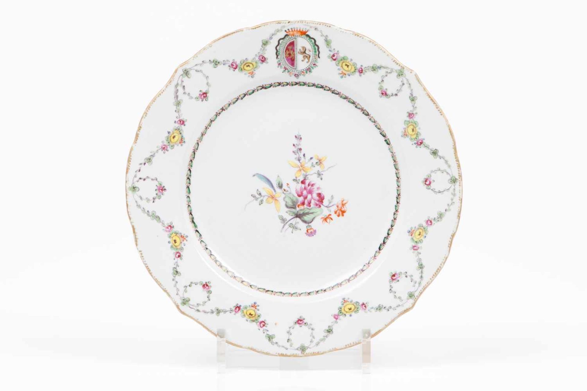 A scalloped plateChinese export porcelain"Famille Rose" polychrome and gilt decoration with armorial