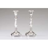 A pair of neoclassical candlestandsSilverPlain hexagonal shaft on a square stand with ball