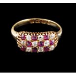 A ringSet in 18kt gold with nine synthetic rubies and nine old mine cut diamonds (ca. 0,45ct)1906