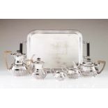 A tea and coffee set and trayEnglish silver plate. Part fluted body with wooden handles (6 pieces)(