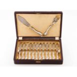 A fish cutlery setSilverStylised dolphin shaped handles with engraved blades12 forks, 12 knifes