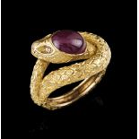 A ring, LUIZ FERREIRA19kt gold chiselled as a snake and set with one cabochon ruby and two small
