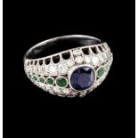 A ringSet in platinum with one sapphire and small brilliant cut diamonds and emeraldsPortugal,