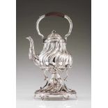 A tea pot on standRaised, chiselled and spiral scalloped French silverCluster lid pommel, sculpted