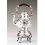 A tea pot and stand800/000 silverDensely decorated body with gadroons, shells, acanthus leaves,