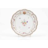 A scalloped plateChinese export porcelainPolychrome and gilt "Famille Rose" enamels decoration