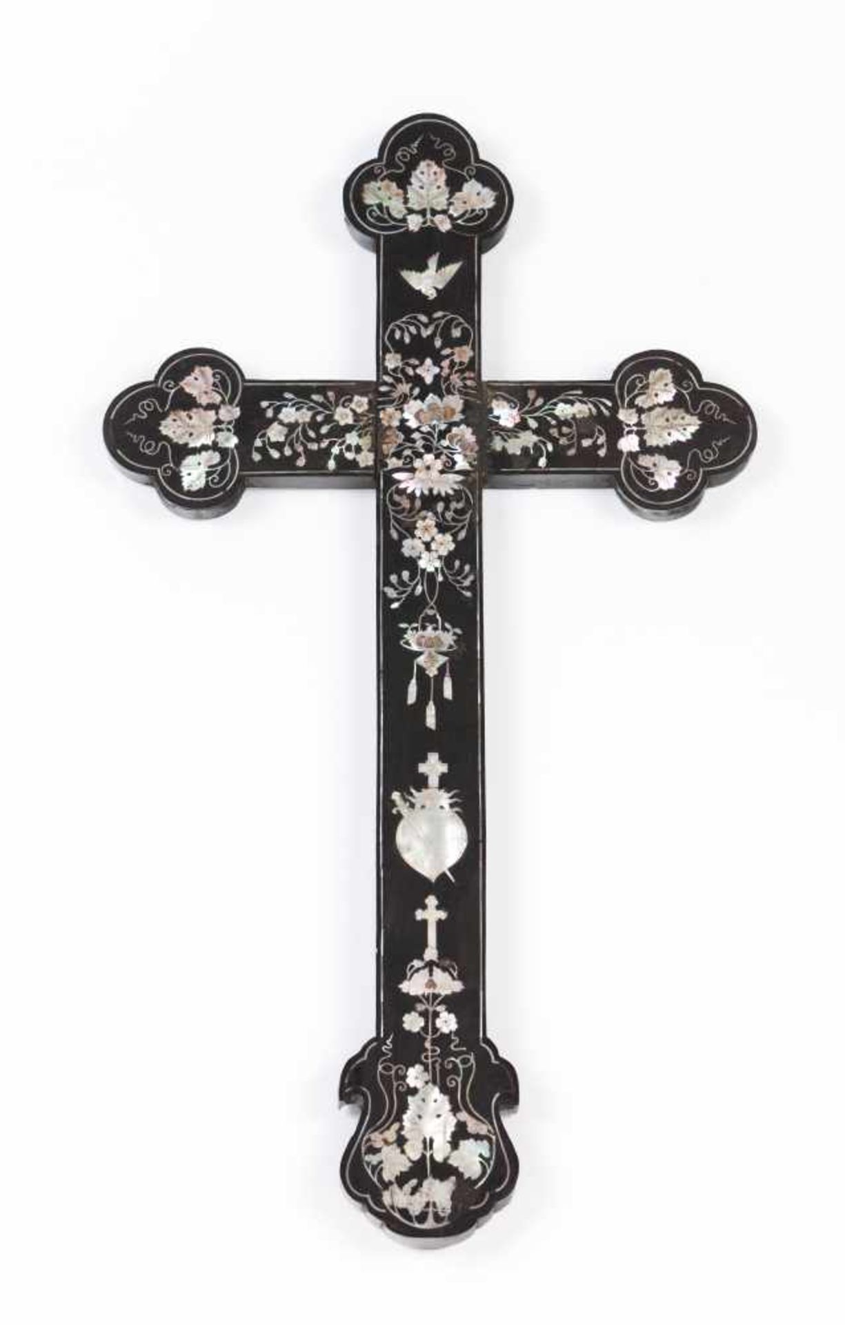 A crucifixEbonyDecorated in mother-of-pearl inlay with foliage scroll motifs, dove and flaming heart