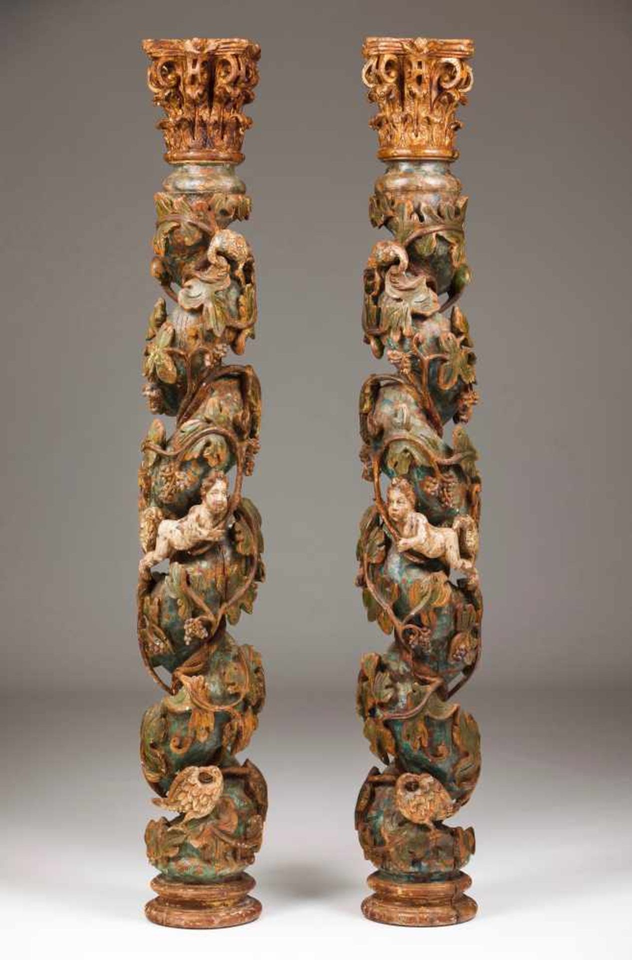 A pair of twisted columsCarved, gilt and polychrome woodDecorated with baroque carving of vine