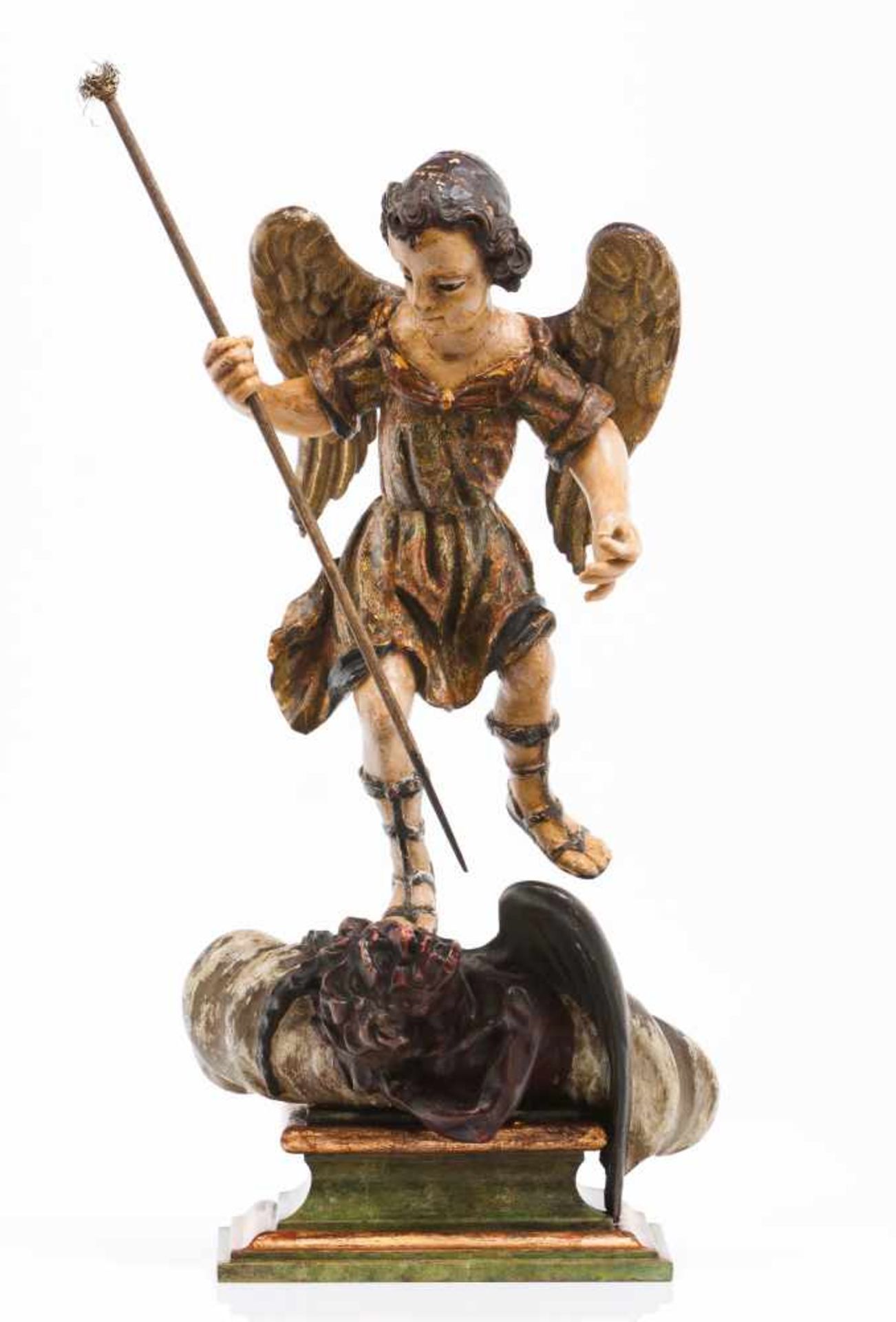 Saint MichaelCarved and polychrome wood sculpture with glass eyesDepicting Saint Michael killing the