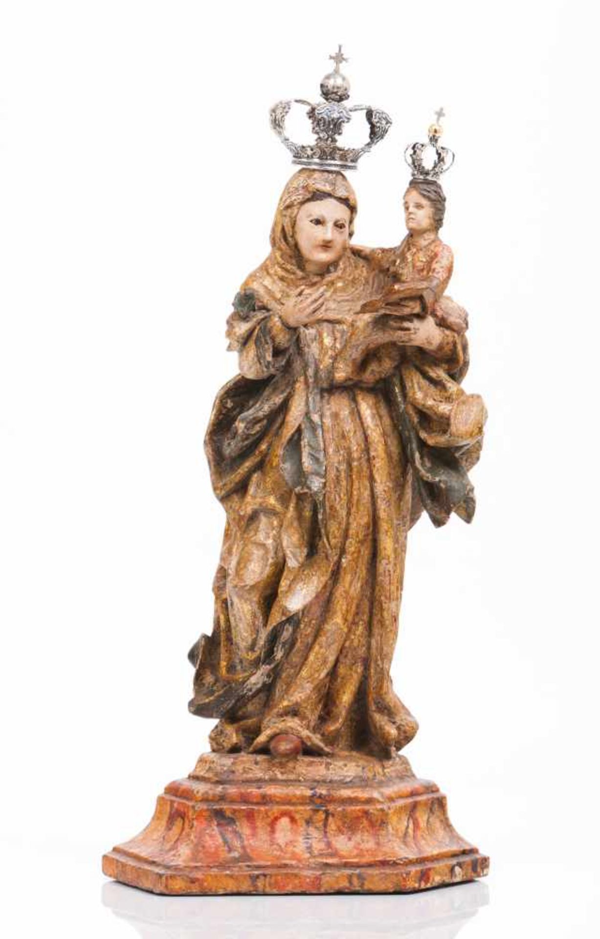 Saint AnneCarved, gilt and polychrome wooden sculptureDepicting Saint Anne teaching the Virgin how