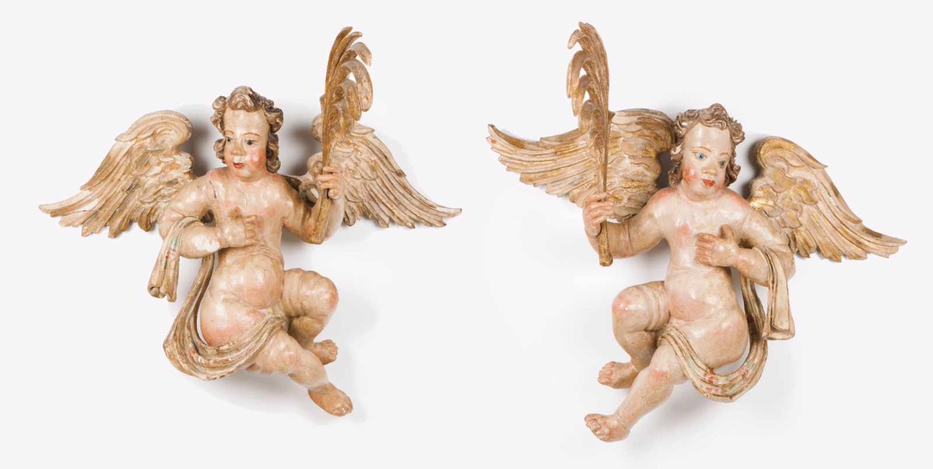 A pair of angelsPolychrome and gilt wood sculpturesWinged angels with palmsPortugal, 17th century(