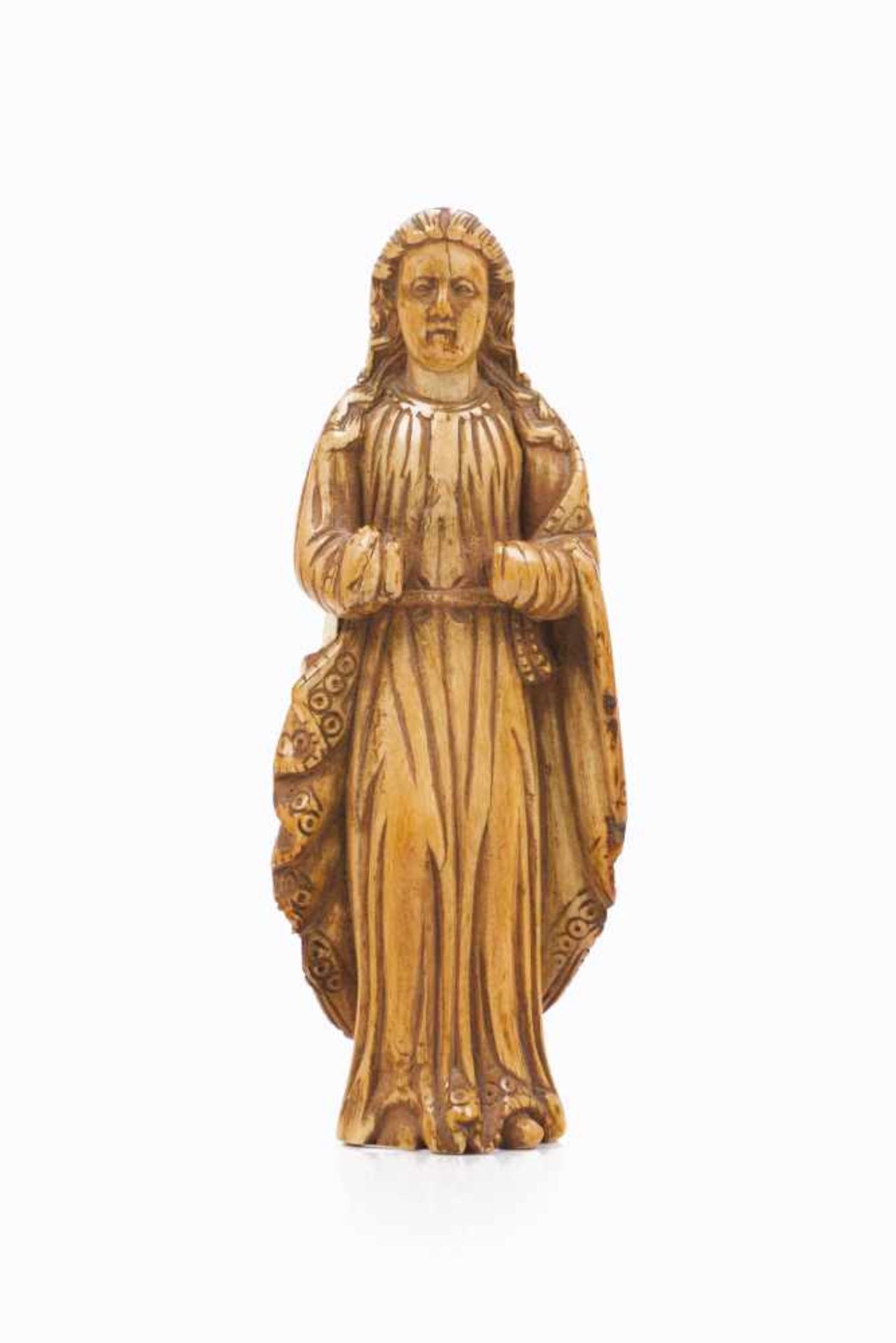 Our LadyIvory Indo-Portuguese sculpture18th century(losses and small defects)Height: 10,5 cm