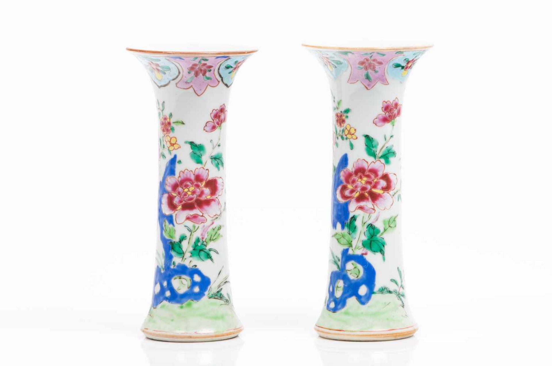 A pair of cylindrical vasesChinese export porcelainPolychrome "Famille Rose" enamels decoration of