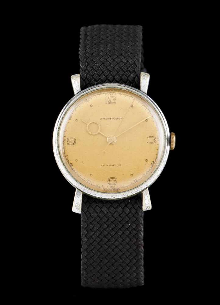 JustusJustus Watch, antimagnetique model. Winding mechanical movement. Dial with periferical