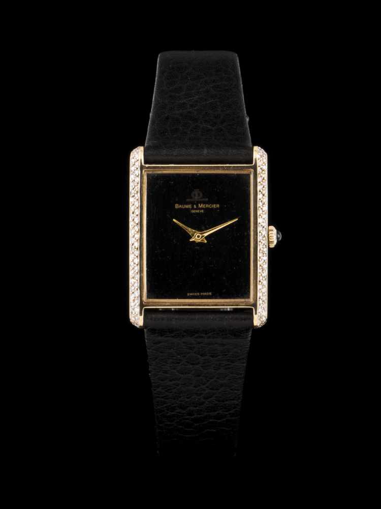 Baume & MercierLady's watch with 25mm x 30mm gold case with brilliant cut diamond. Mechanical