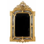 A mirrorBox frameRaised gilt metal decoration of flower and foliage motifsScalloped topEurope,