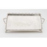 A trayPortuguese silverRectangular shaped chiselled base of floral and foliage motifs and