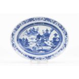 A fish trayChinese export porcelainBlue underglaze decoration with riverscape and pagodaQing