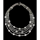 A choker necklaceGoldArticulated chain of elements entirely set with 930 small brilliant cut