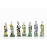 A set of seven immortalsChinese porcelain sculpturesPolychrome decorationQing dynasty, 19th