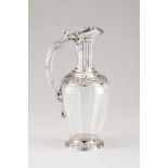 A jugFrench silver an decorated glassRaised friezes of foliage and grape motifsFluted handle of